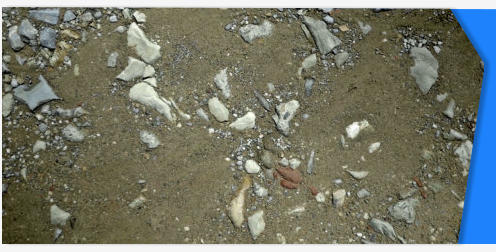 Rocks in sand stock footage