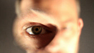 Eye through magnifier stock footage