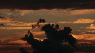 Twilight silhouetted cloud stock footage