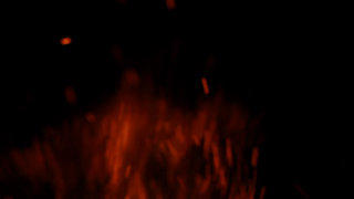 Fire sparks flying embers background