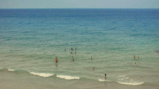 People swimming in the sea stock footage